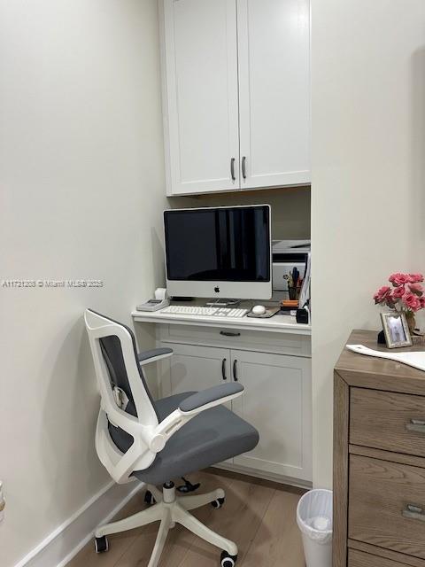 office featuring hardwood / wood-style flooring