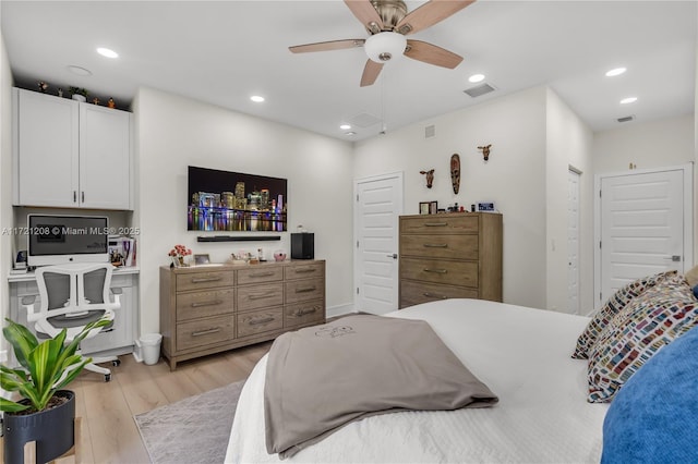 bedroom featuring ceiling fan, light wood-type flooring, visible vents, and recessed lighting