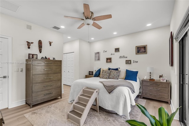 bedroom featuring recessed lighting, visible vents, and light wood-style floors