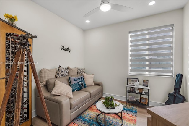 living room with ceiling fan, baseboards, wood finished floors, and recessed lighting