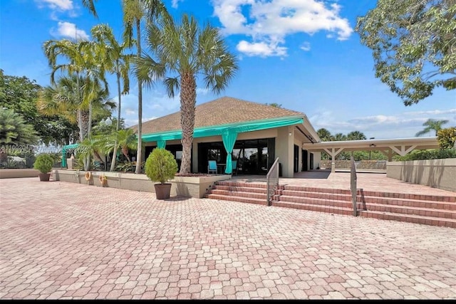 view of home's community featuring a patio