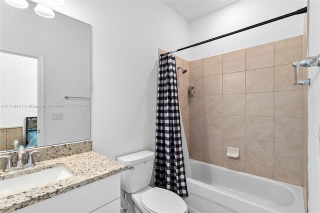 full bathroom with shower / bath combo with shower curtain, vanity, and toilet