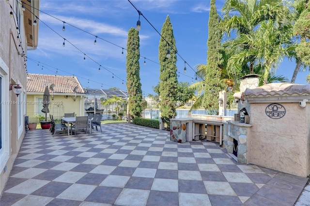 view of patio with an outdoor bar