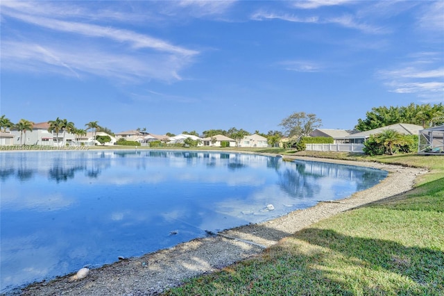 view of pool with a water view