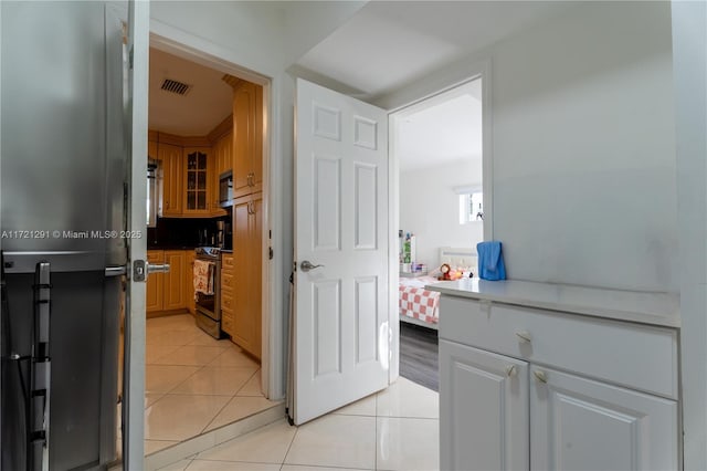 bathroom featuring tile patterned flooring