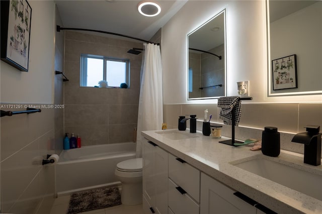 full bathroom with tile patterned floors, vanity, shower / bath combination with curtain, and toilet