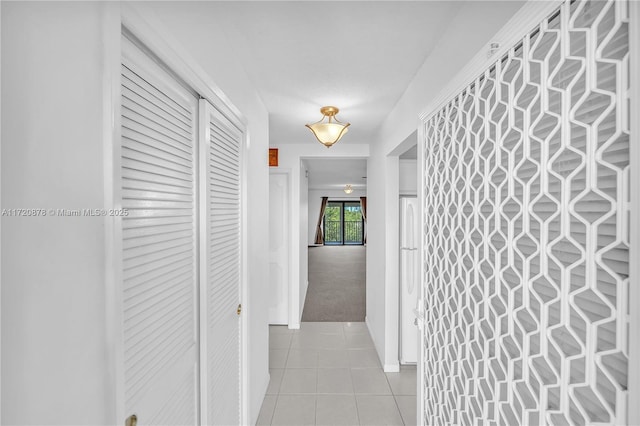 hallway with light tile patterned floors