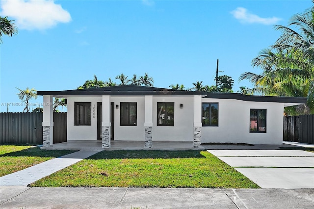 contemporary house with a porch and a front yard