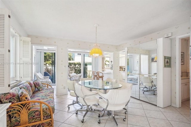 dining space with light tile patterned floors