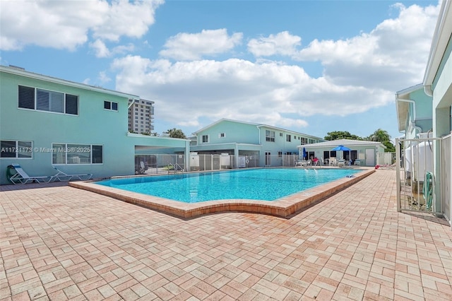 view of pool featuring a patio area