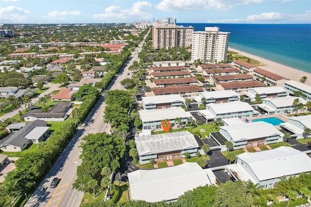 aerial view featuring a view of the beach and a water view