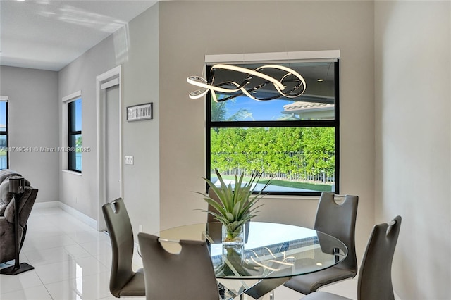 dining room featuring light tile patterned floors