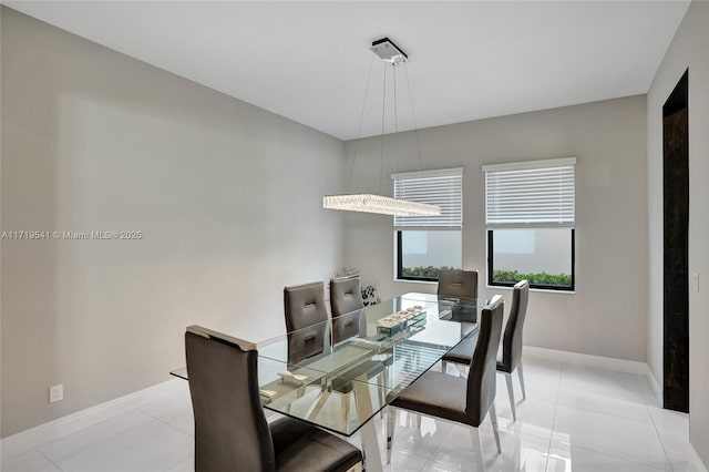 view of tiled dining space