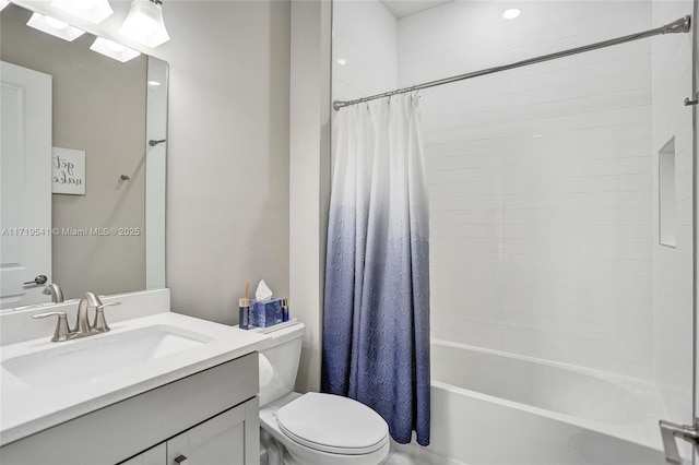 full bathroom featuring shower / bathtub combination with curtain, vanity, and toilet