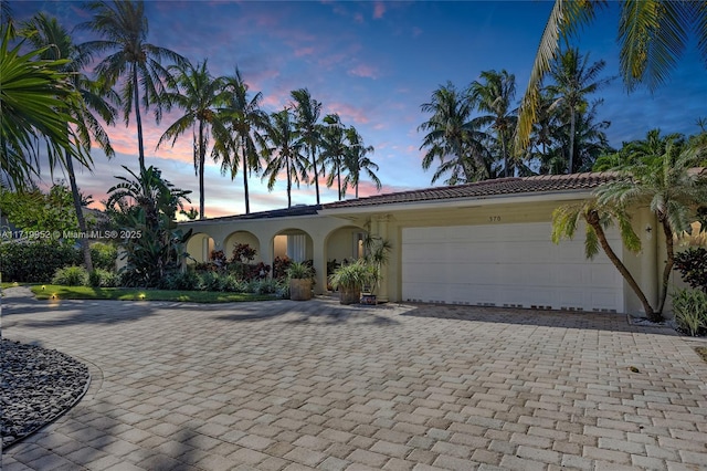 view of front of property featuring a garage