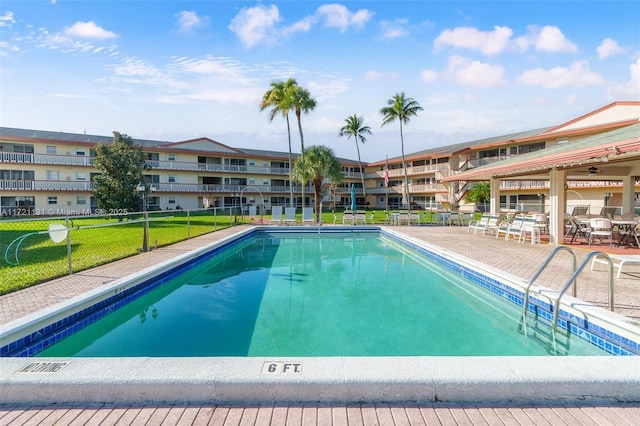 view of pool featuring a patio