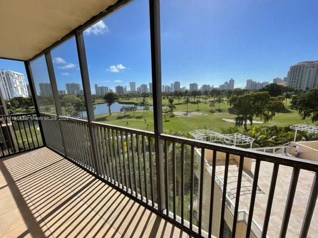 balcony featuring a water view