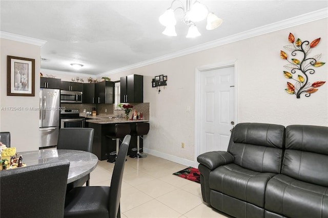 living room featuring light tile patterned floors, a notable chandelier, and ornamental molding