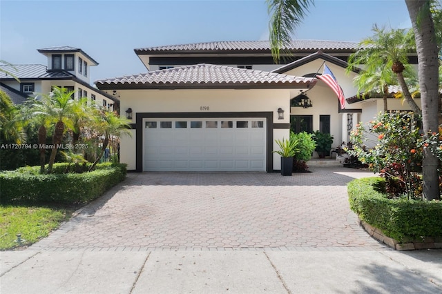 view of front of property featuring a garage