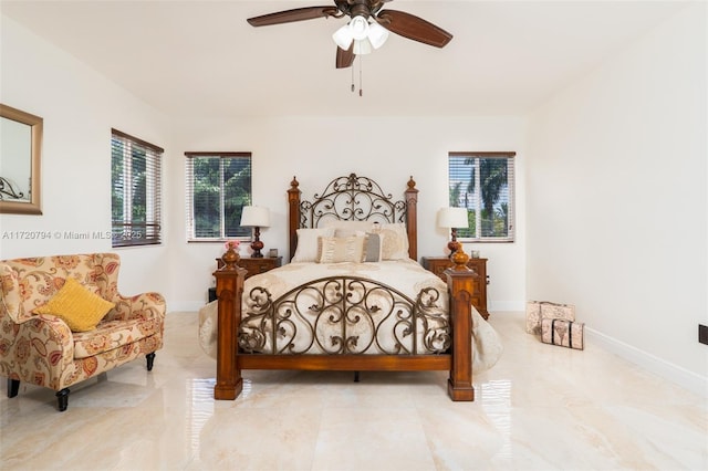 bedroom featuring ceiling fan