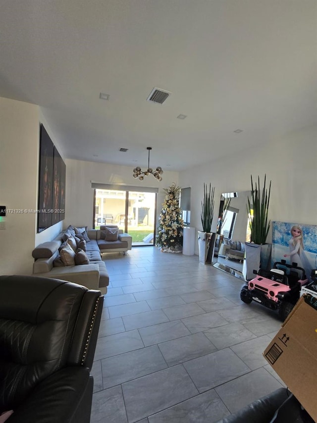 living room featuring a chandelier