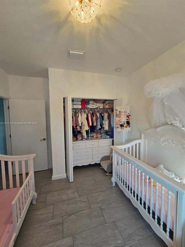 bedroom with a nursery area