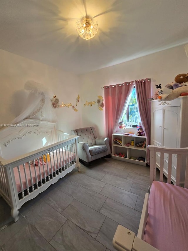 unfurnished bedroom featuring a crib