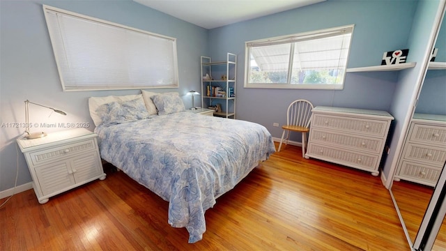 bedroom featuring hardwood / wood-style floors