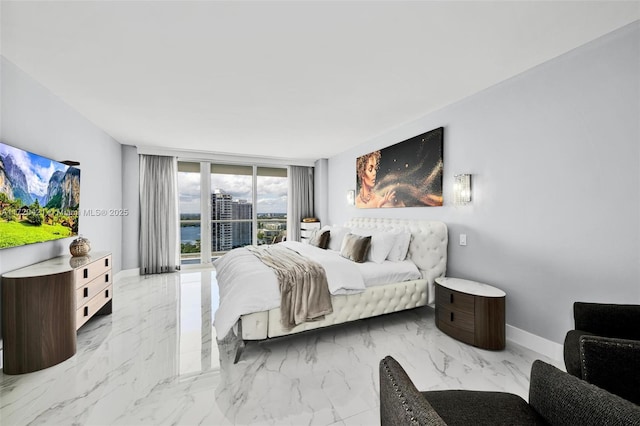 bedroom with floor to ceiling windows