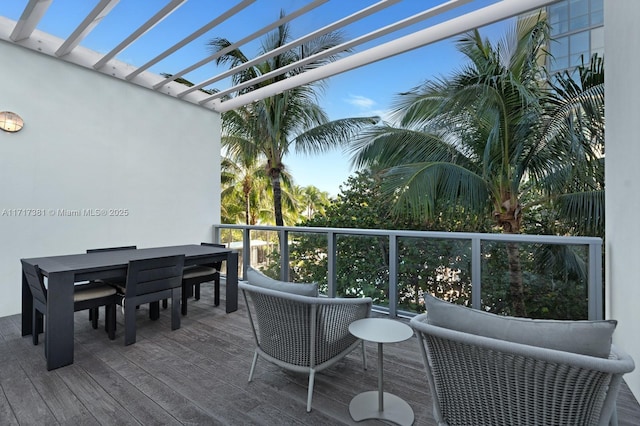 wooden terrace with a pergola