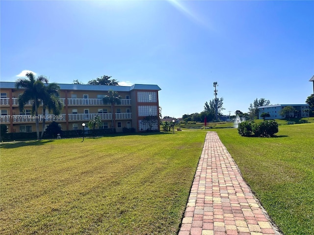 view of community with a yard