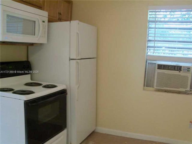 kitchen with white cabinets, white appliances, and cooling unit