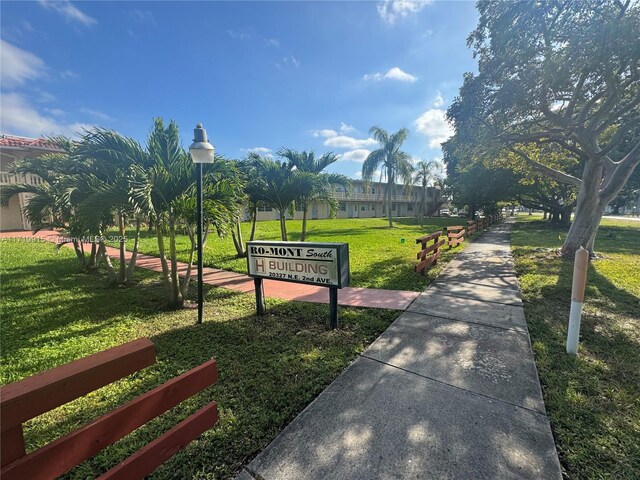 view of community featuring a lawn