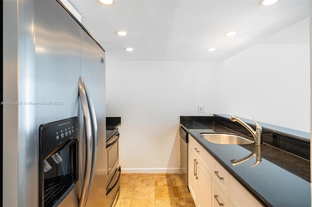 kitchen with white cabinetry, sink, and appliances with stainless steel finishes