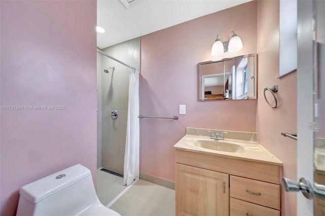 bathroom with vanity, a shower with curtain, and toilet