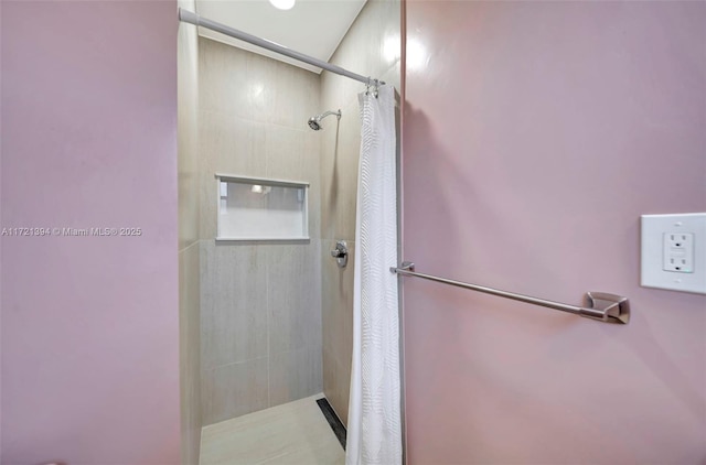 bathroom featuring walk in shower