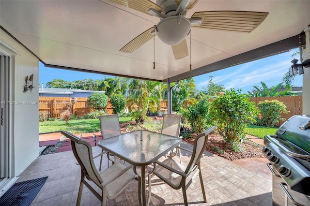 view of patio / terrace featuring a grill and ceiling fan