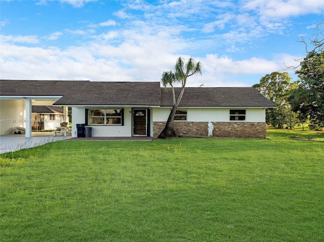 ranch-style house with a front lawn