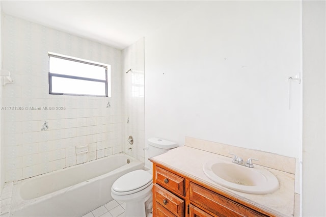 full bathroom with tile patterned flooring, vanity, tiled shower / bath combo, and toilet