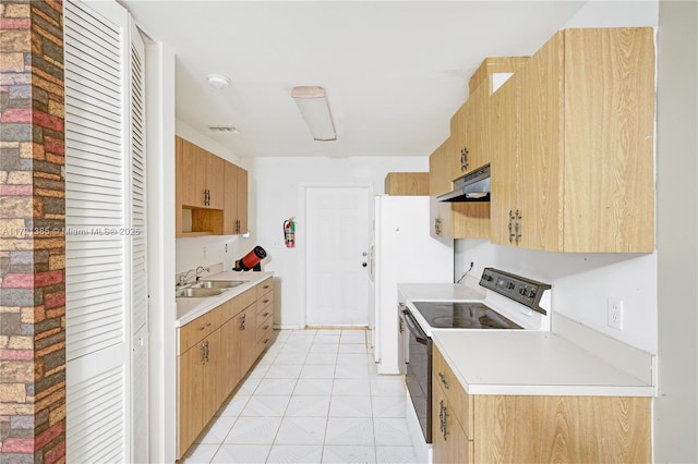 kitchen featuring white electric range oven, light tile patterned flooring, and sink