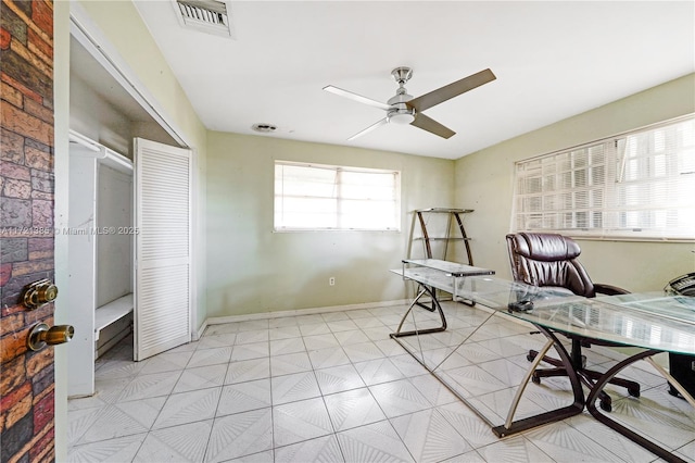 office space with ceiling fan