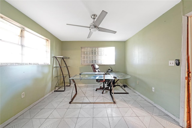 office area with ceiling fan