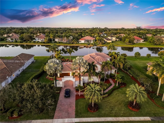 14403 S Jockey Cir S, Davie, FL 33330 - aerial view at dusk of a water view and a residential view