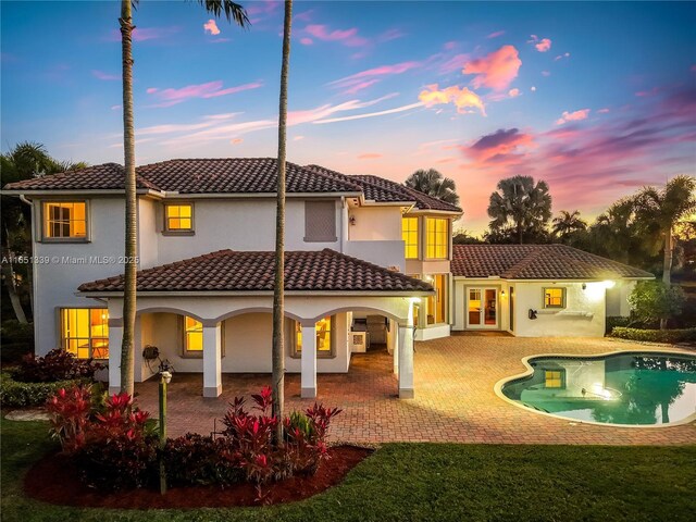 14403 S Jockey Cir S, Davie, FL 33330 - mediterranean / spanish home featuring stucco siding and a tiled roof