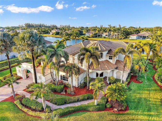 bird's eye view with a water view and a residential view