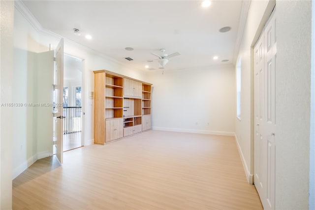 interior space featuring recessed lighting, visible vents, light wood-style flooring, ornamental molding, and baseboards