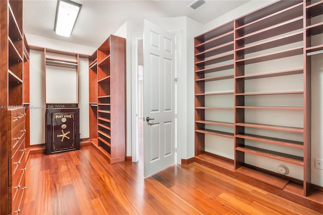 14403 S Jockey Cir S, Davie, FL 33330 - walk in closet with wood finished floors