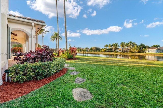 14403 S Jockey Cir S, Davie, FL 33330 - view of green lawn with a water view