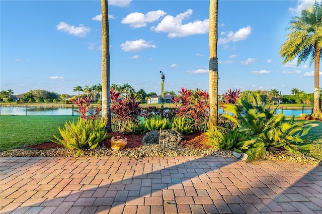 14403 S Jockey Cir S, Davie, FL 33330 - view of patio / terrace with a water view