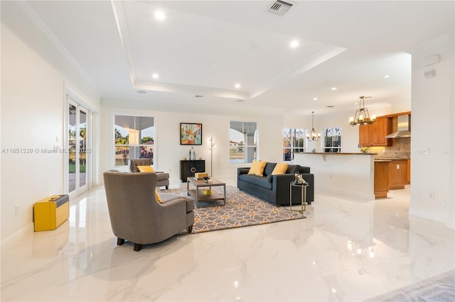 14403 S Jockey Cir S, Davie, FL 33330 - living area with a chandelier, light marble finish flooring, recessed lighting, and a raised ceiling